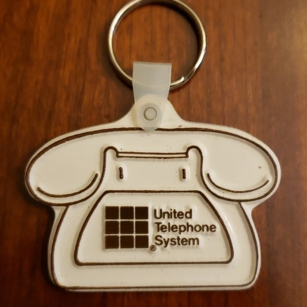 VINTAGE United Telephone Plastic Keychain